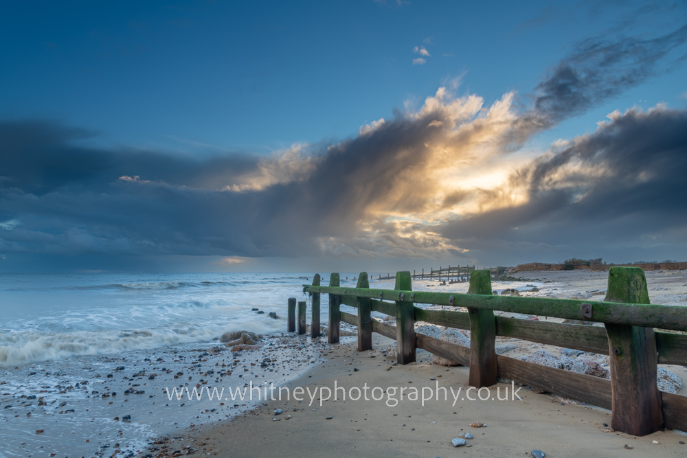 Climping Beach breakwater leading into the sunset in West Sussex