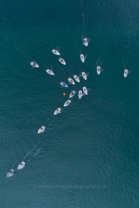Aerial Drone photograph of solo sailing dinghies at Felpham near Bognor Regis in West Sussex