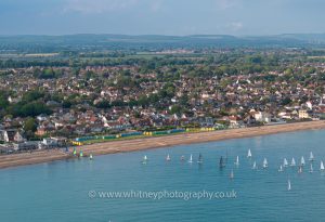 Aerial photograph of Felpham Sailing Club and village with the South Downs and Arundel Caste