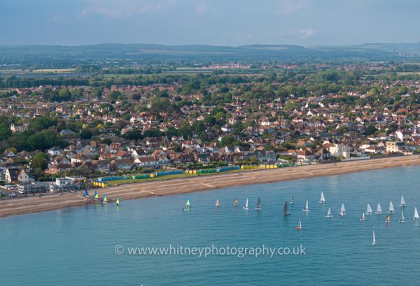 Aerial photograph of Felpham Sailing Club and village with the South Downs and Arundel Caste